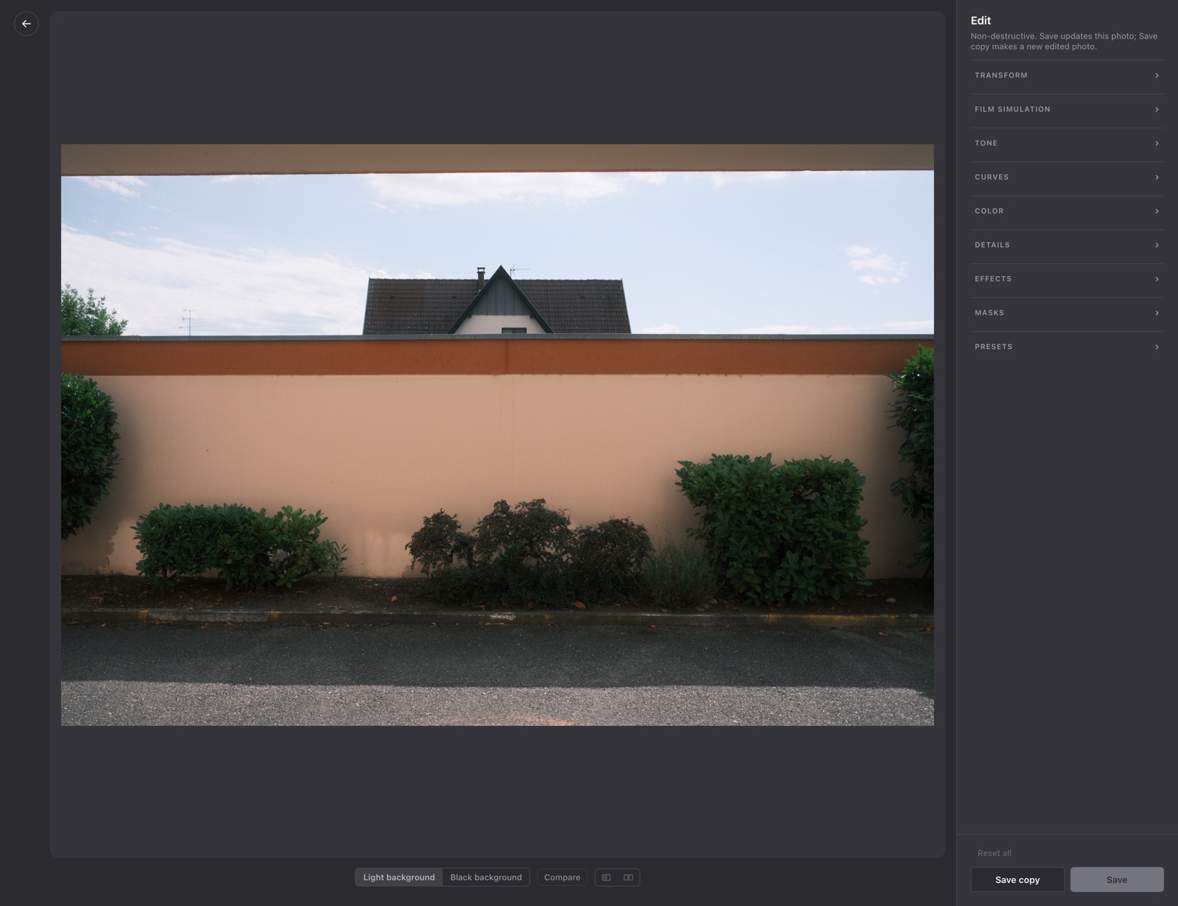The editor: the photo on the left and the panel list on the right, from transform and film simulation down through tone, curves, colour, details, effects, masks and presets.
